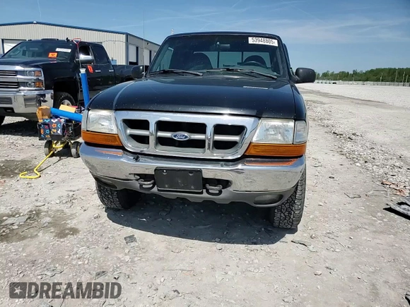 1999 Ford Ranger XLT with VIN 1FTZR15X8XTB13048, listed as a Copart auction lot 53948805 with 154,436 mi miles and Salvage title. Bid and sale history available at DreamBid. Image 13.