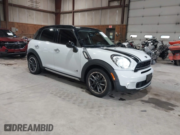 2016 MINI Countryman S with VIN WMWZC5C57GWU20085, listed as a IAAI auction lot 42403406 with 90,592 mi miles and . Bid and sale history available at DreamBid. Image 1.