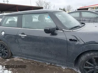 2020 MINI Hardtop Cooper S z VIN WMWXR5C07L2L60692, wystawiony jako IAAI lot #41621462 z przebiegiem 66 898 mil mil oraz . Historia ofert i sprzedaży dostępna na DreamBid. Obrazek 14.