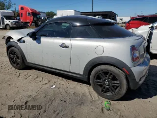 2014 MINI Coupe S z VIN WMWSX3C57ET409158, wystawiony jako Copart lot #81650034 z przebiegiem 118 523 mil mil oraz Szkody całkowita. Historia ofert i sprzedaży dostępna na DreamBid. Obrazek 2.