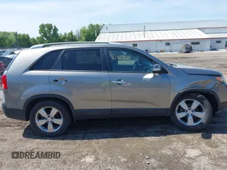 2012 Kia Sorento EX with VIN 5XYKUDA61CG244312, listed as a IAAI auction lot 42343888 with 164,520 mi miles and . Bid and sale history available at DreamBid. Image 13.