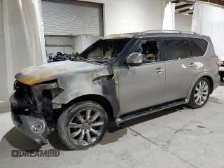 2013 Infiniti QX56 z VIN JN8AZ2NF2D9550941, wystawiony jako Copart lot #70451624 z przebiegiem Nie podano mil oraz Szkoda całkowita • Salvage title. Historia ofert i sprzedaży dostępna na DreamBid. Obrazek 1.