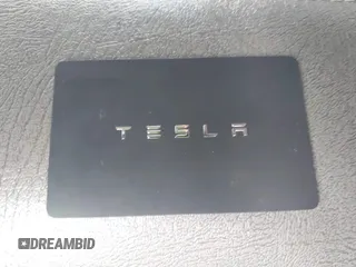 2020 Tesla Model 3 Standard Range Plus with VIN 5YJ3E1EA7LF785838, listed as a IAAI auction lot 41586081 with 38,392 mi miles and . Bid and sale history available at carsss.com. Image 11.