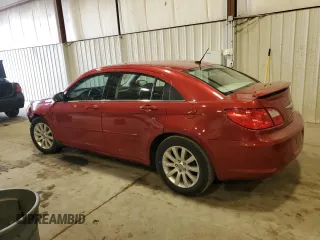 2010 Chrysler Sebring Limited with VIN 1C3CC5FB5AN146719, listed as a Copart auction lot 82712994 with 52,774 mi miles and Salvage Title. Bid and sale history available at carsss.com. Image 2.