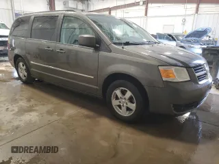 2010 Dodge Grand Caravan SXT with VIN 2D4RN5D1XAR268587, listed as a Copart auction lot 55072485 with 322,312 mi miles and Non Repairable. Bid and sale history available at DreamBid. Image 4.