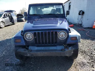 1997 Jeep Wrangler Sport with VIN 1J4FY19S2VP498840, listed as a Copart auction lot 50058885 with 151,697 mi miles and Salvage Title. Bid and sale history available at carsss.com. Image 5.
