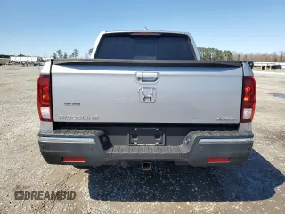 2019 Honda Ridgeline RTL-E with VIN 5FPYK3F77KB015092, listed as a Copart auction lot 48459345 with Not provided miles and Salvage title. Bid and sale history available at DreamBid. Image 6.