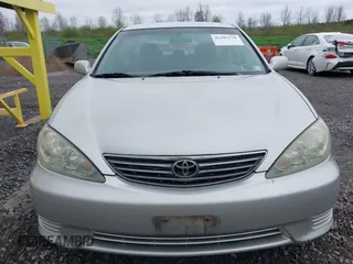 2006 Toyota Camry STD with VIN 4T1BE32K26U670270, listed as a IAAI auction lot 42185538 with 203,431 mi miles. Bid and sale history available at carsss.com. Image 6.