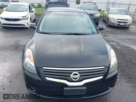 2009 Nissan Altima SL with VIN 1N4BL21E09N523885, listed as a IAAI auction lot 42532218 with 169,350 mi miles and . Bid and sale history available at DreamBid. Image 6.