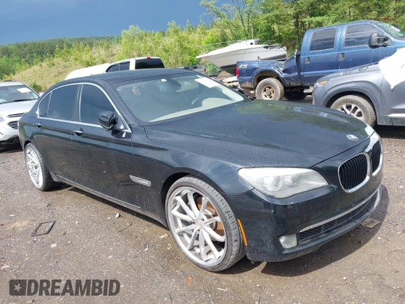 2011 BMW 7 Series 740Li with VIN WBAKB4C5XBC392890, listed as a IAAI auction lot 42108817 with 162,874 mi miles. Bid and sale history available at carsss.com. Image 1.