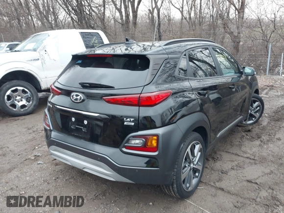 2021 Hyundai Kona Ultimate with VIN KM8K5CA59MU657508, listed as a IAAI auction lot 41144378 with 15,828 mi miles. Bid and sale history available at carsss.com. Image 4.