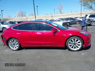 2018 Tesla Model 3 Long Range Battery with VIN 5YJ3E1EB5JF146184, listed as a IAAI auction lot 41808346 with 97,496 mi miles and . Bid and sale history available at DreamBid. Image 14.