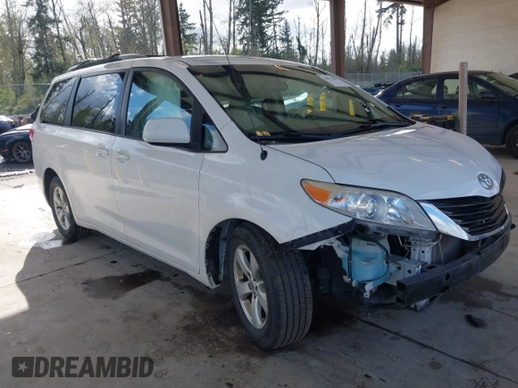 2014 Toyota Sienna LE AAS with VIN 5TDKK3DC4ES505293, listed as a IAAI auction lot 42021409 with 70,319 mi miles. Bid and sale history available at carsss.com. Image 1.