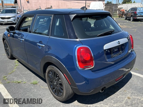 2015 MINI Hardtop 4 Door with VIN WMWXS5C5XFT831166, listed as a Copart auction lot 56714285 with 69,668 mi miles and Salvage Title. Bid and sale history available at DreamBid. Image 3.