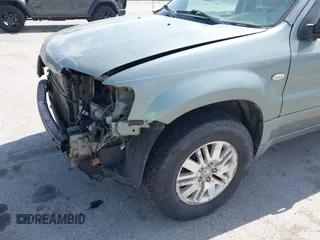 2006 Mercury Mariner Luxury с VIN 4M2CU57196KJ06015, выставлен на аукционе IAAI как лот 42579940 с пробегом 207 529 миль миль и . История ставок и продаж доступна на DreamBid. Изображение 13.