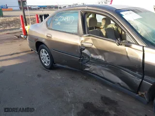 2003 Chevrolet Impala with VIN 2G1WF52E839335377, listed as a IAAI auction lot 41774917 with 189,350 mi miles. Bid and sale history available at carsss.com. Image 6.