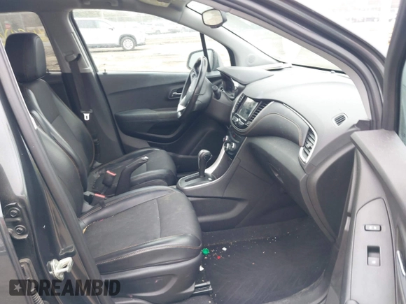 2018 Chevrolet Trax LT with VIN 3GNCJLSB2JL409509, listed as a IAAI auction lot 41800104 with 84,630 mi miles and . Bid and sale history available at carsss.com. Image 5.