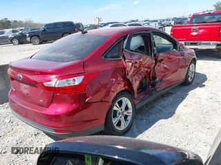 2014 Ford Focus SE with VIN 1FADP3F28EL179150, listed as a IAAI auction lot 41821710 with 147,756 mi miles and . Bid and sale history available at DreamBid. Image 4.