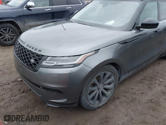 2018 Land Rover Range Rover Velar S z VIN SALYB2RV6JA750501, wystawiony jako IAAI lot #40882723 z przebiegiem 77 338 mil mil oraz . Historia ofert i sprzedaży dostępna na DreamBid. Obrazek 2.