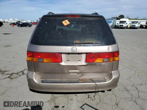 2003 Honda Odyssey EX-L z VIN 5FNRL18043B154662, wystawiony jako Copart lot #52896015 z przebiegiem 216 099 mil mil oraz Szkoda całkowita • Salvage title. Historia ofert i sprzedaży dostępna na DreamBid. Obrazek 6.