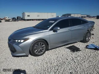 2022 Toyota Avalon XLE with VIN 4T1JZ1FB9NU082055, listed as a Copart auction lot 84205554 with 57,244 mi miles and Salvage Title. Bid and sale history available at carsss.com. Image 1.
