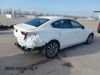 2023 Mazda 3 S Premium with VIN 3MZBPBDM7PM363574, listed as a IAAI auction lot 41585343 with 28,111 mi miles and . Bid and sale history available at DreamBid. Image 4.