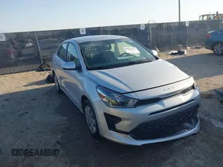 2023 Kia Rio S z VIN 3KPA24AD2PE545609, wystawiony jako IAAI lot #41993823 z przebiegiem 12 186 mil mil oraz . Historia ofert i sprzedaży dostępna na DreamBid. Obrazek 1.