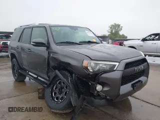 2015 Toyota 4Runner Limited with VIN JTEBU5JR4F5267303, listed as a IAAI auction lot 40769369 with 145,090 mi miles and . Bid and sale history available at carsss.com. Image 1.