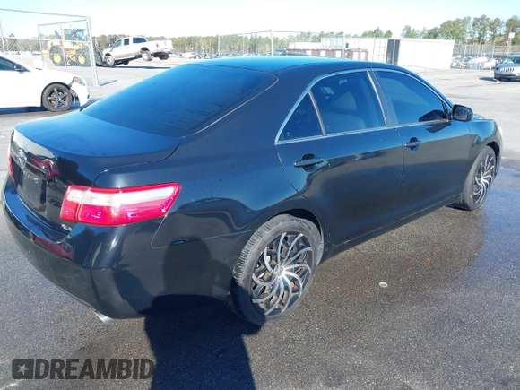 2009 Toyota Camry LE with VIN 4T1BK46K29U582722, listed as a IAAI auction lot 41868420 with 187,853 mi miles. Bid and sale history available at carsss.com. Image 4.