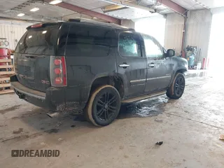 2011 GMC Yukon Denali with VIN 1GKS2EEF2BR258374, listed as a IAAI auction lot 41653820 with 227,468 mi miles. Bid and sale history available at carsss.com. Image 4.