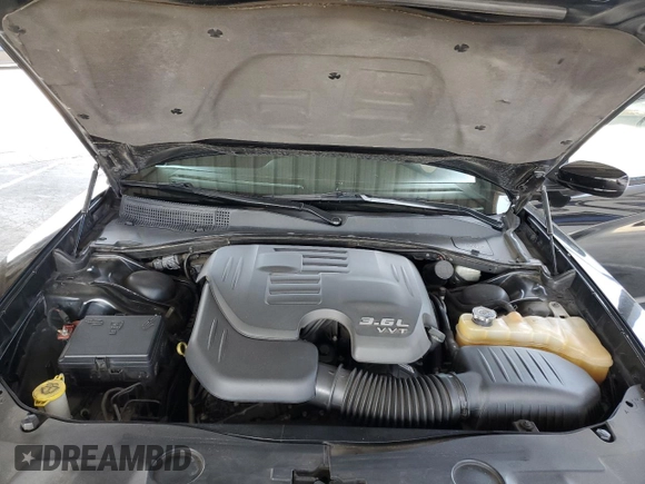 2013 Dodge Charger SE with VIN 2C3CDXBG9DH514410, listed as a Copart auction lot 54234975 with 85,359 mi miles and Salvage Title. Bid and sale history available at DreamBid. Image 11.