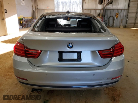 2015 BMW 4 Series 428i z VIN WBA4A5C51FG052009, wystawiony jako Copart lot #89110235 z przebiegiem 156 675 mil mil oraz Szkoda całkowita • Salvage title. Historia ofert i sprzedaży dostępna na DreamBid. Obrazek 6.