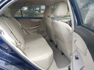2013 Toyota Corolla L with VIN 5YFBU4EE5DP095580, listed as a IAAI auction lot 42147355 with 180,447 mi miles. Bid and sale history available at carsss.com. Image 8.