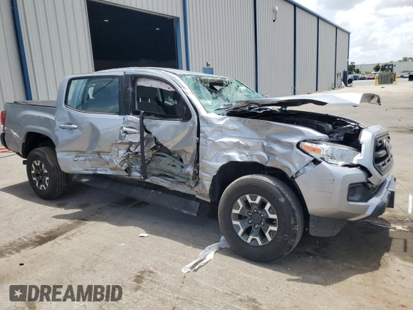 2017 Toyota Tacoma SR5 with VIN 5TFCZ5AN2HX102011, listed as a Copart auction lot 60784795 with 61,742 mi miles and Salvage title. Bid and sale history available at DreamBid. Image 4.