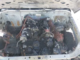 2007 Jeep Wrangler Sahara with VIN 1J4FA54147L184109, listed as a IAAI auction lot 42183722 with Not provided miles and . Bid and sale history available at DreamBid. Image 10.