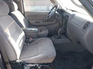 2003 Toyota Tacoma PreRunner z VIN 5TEGN92N63Z152916, wystawiony jako IAAI lot #42153765 z przebiegiem 229 221 mil mil oraz . Historia ofert i sprzedaży dostępna na DreamBid. Obrazek 5.
