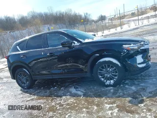 2020 Mazda CX-5 Touring with VIN JM3KFBCM5L0866189, listed as a IAAI auction lot 41829901 with 31,627 mi miles. Bid and sale history available at carsss.com. Image 13.