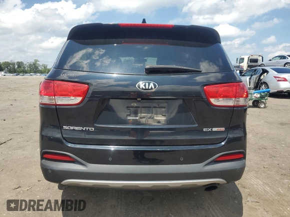 2016 Kia Sorento EX with VIN 5XYPHDA16GG033238, listed as a Copart auction lot 60362415 with 121,220 mi miles and Salvage title. Bid and sale history available at DreamBid. Image 6.
