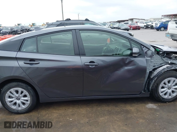 2022 Toyota Prius L Eco with VIN JTDKAMFU4N3183352, listed as a IAAI auction lot 42170623 with 52,244 mi miles and . Bid and sale history available at DreamBid. Image 14.