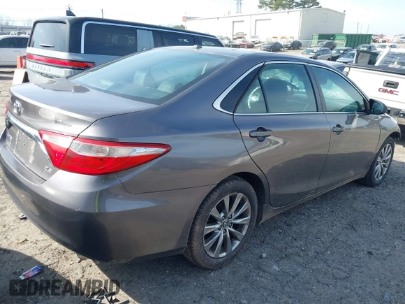 2015 Toyota Camry XLE with VIN 4T1BF1FK2FU014159, listed as a IAAI auction lot 41678454 with 126,113 mi miles and . Bid and sale history available at DreamBid. Image 4.