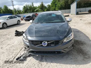 2015 Volvo V60 z VIN YV1902SS6F1227756, wystawiony jako Copart lot #57962725 z przebiegiem 62 542 mil mil oraz Szkoda całkowita • Salvage title. Historia ofert i sprzedaży dostępna na DreamBid. Obrazek 5.