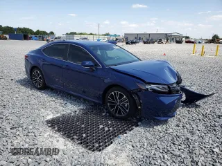 2025 Toyota Camry LE with VIN 4T1DAACK0SU075581, listed as a Copart auction lot 54570525 with 2,329 mi miles and Non Repairable. Bid and sale history available at DreamBid. Image 4.