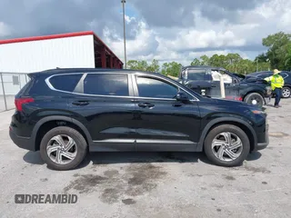 2021 Hyundai Santa Fe SE z VIN 5NMS14AJ0MH332918, wystawiony jako IAAI lot #42365534 z przebiegiem 58 720 mil mil oraz . Historia ofert i sprzedaży dostępna na DreamBid. Obrazek 13.