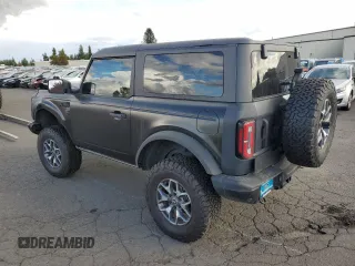 2023 Ford Bronco with VIN 1FMDE5CP1PLA92944, listed as a Copart auction lot 66625304 with 115,179 mi miles and Salvage title. Bid and sale history available at DreamBid. Image 2.