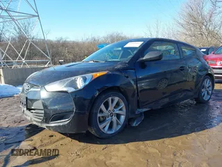 2016 Hyundai Veloster z VIN KMHTC6AD1GU262391, wystawiony jako IAAI lot #41649087 z przebiegiem 96 104 mil mil oraz . Historia ofert i sprzedaży dostępna na DreamBid. Obrazek 6.