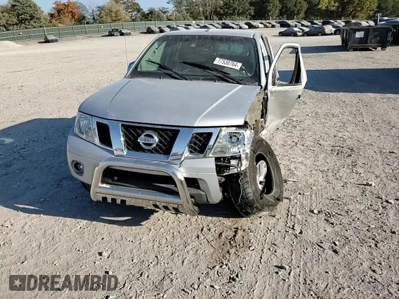 2015 Nissan Frontier S with VIN 1N6AD0EV3FN705610, listed as a Copart auction lot 77530764 with 165,782 mi miles and Salvage title. Bid and sale history available at DreamBid. Image 11.
