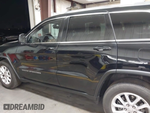 2021 Jeep Grand Cherokee Laredo E z VIN 1C4RJEAG7MC738928, wystawiony jako IAAI lot #42708702 z przebiegiem 63 329 mil mil oraz . Historia ofert i sprzedaży dostępna na DreamBid. Obrazek 14.