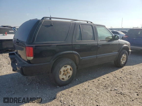 1999 Chevrolet Blazer Trailblazer z VIN 1GNDT13W2X2130625, wystawiony jako Copart lot #50596885 z przebiegiem 187 444 mil mil oraz Czysty tytuł • Clean title. Historia ofert i sprzedaży dostępna na DreamBid. Obrazek 3.