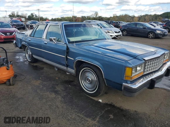 1987 Ford Ltd Crown Victoria with VIN 2FABP73F5HX115600, listed as a Copart auction lot 74781524 with 21,565 mi miles and Salvage Title. Bid and sale history available at carsss.com. Image 4.