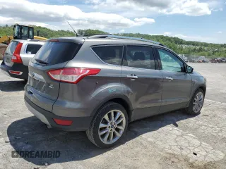 2014 Ford Escape SE с VIN 1FMCU9G90EUC19255, выставлен на аукционе Copart как лот 57267775 с пробегом 102 924 миль миль и Списание • Salvage title. История ставок и продаж доступна на DreamBid. Изображение 3.